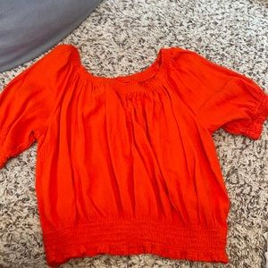 orange off the shoulder tee